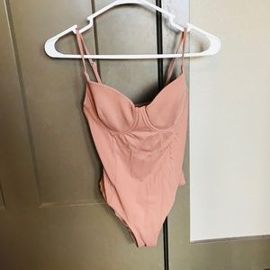Nude body suit